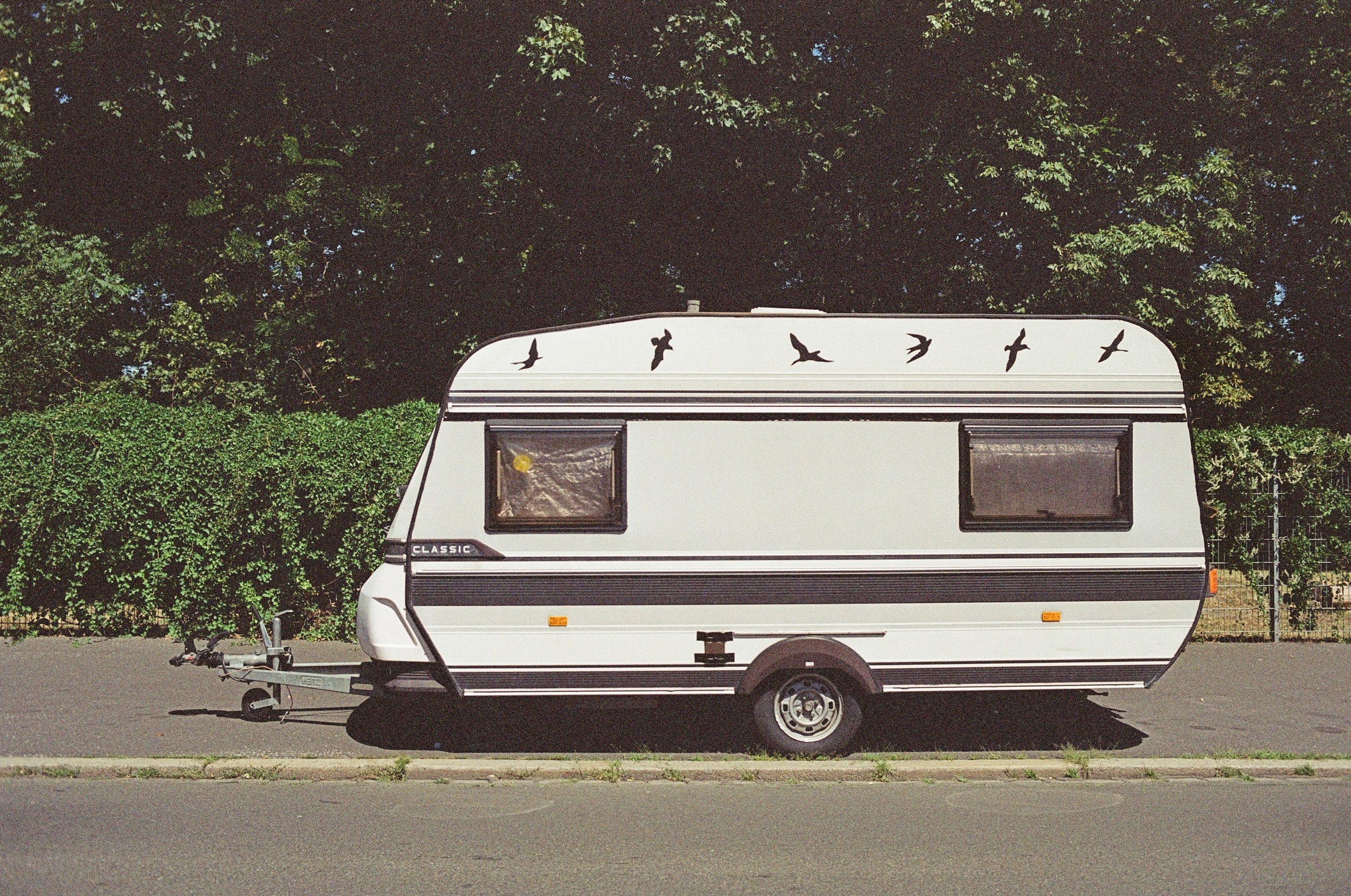 A caravan parked on a pavement